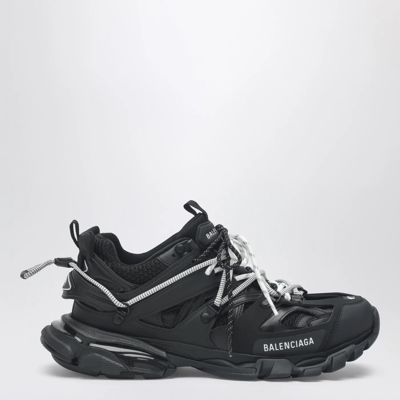 Balenciaga Low Track Sneakers in black and white