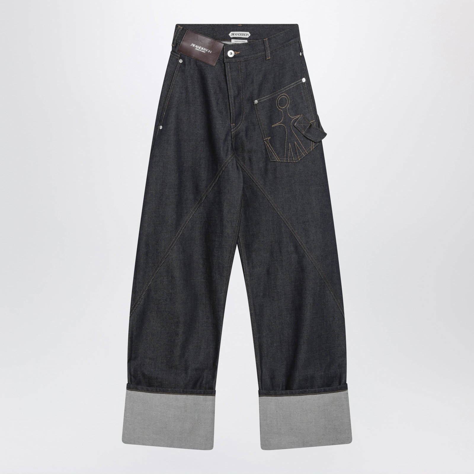 JW Anderson Workwear jeans in indigo denim with twisted turn-up