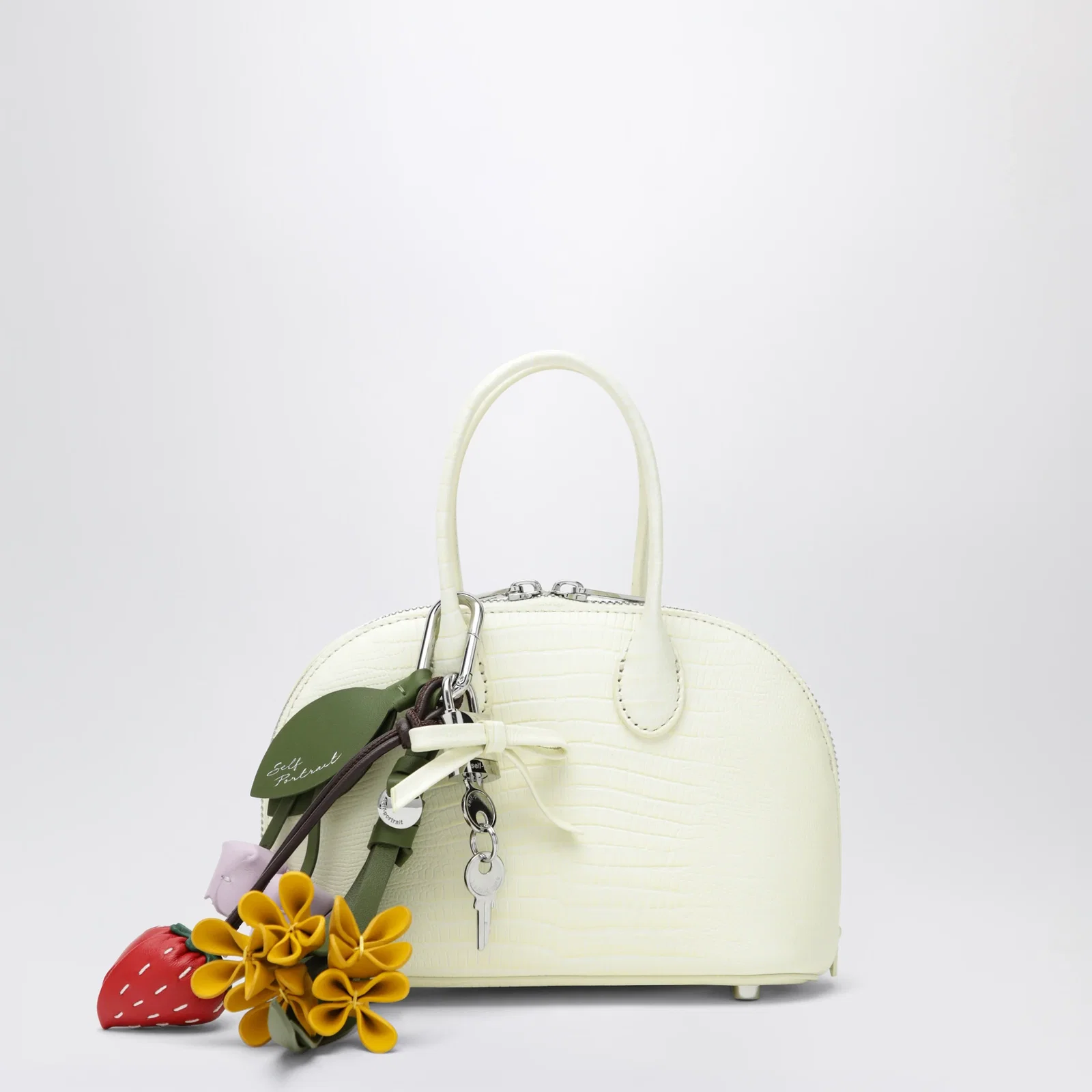 Self-Portrait Mini embossed leather bowling bag in yellow